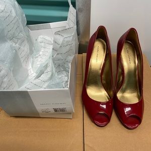 Red patent leather, peep toed pumps